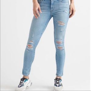 Levi’s 711 ripped light wash skinny jeans